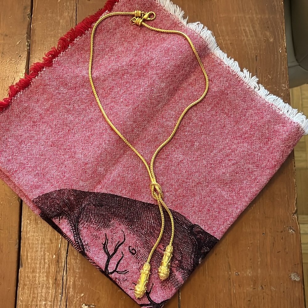 Gold-like beautiful costume necklace with knot